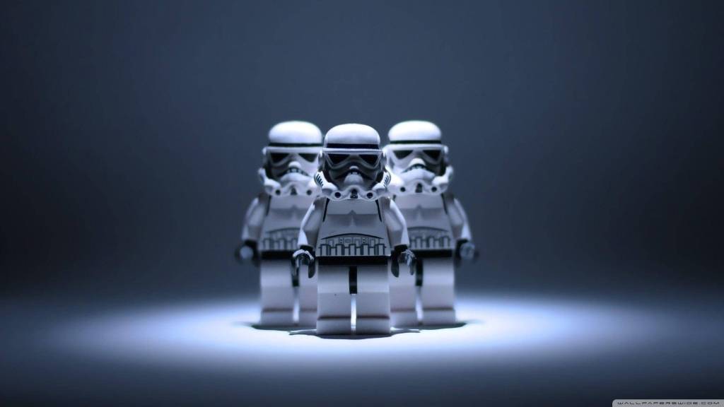 4k Lego Star Wars Stormtrooper Wallpaper
This 4k Lego Wallpaper Shows Three Stormtroopers Under A Spotlight.